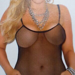Fishnet dress with g string.
